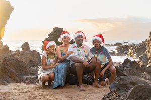 Maui family photographer photo against beautiful Maui sunset beach by ohwowfotos.