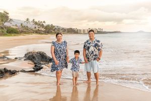Maui family photographer photo against beautiful Maui sunset beach by ohwowfotos.