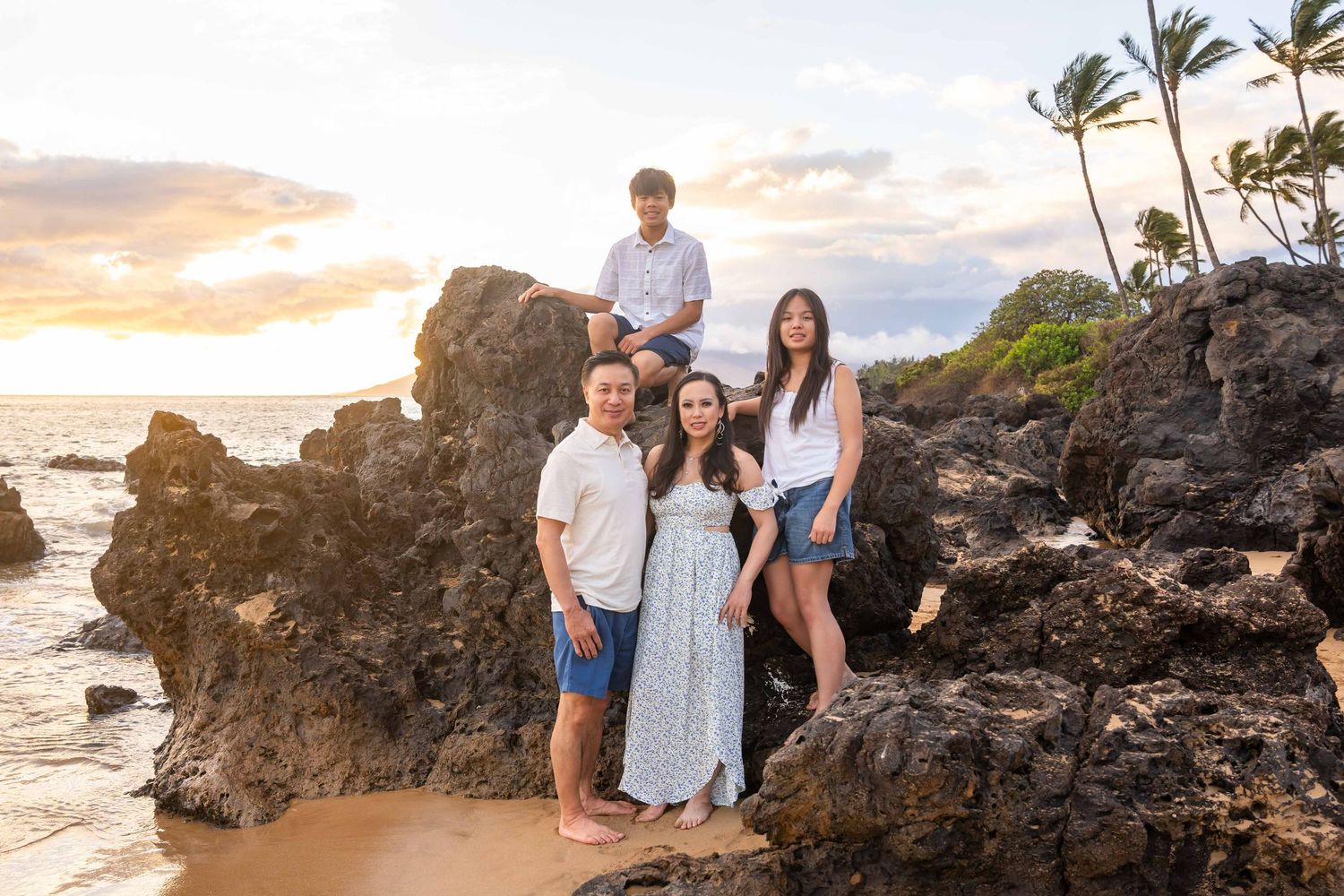 Maui family photographer photo against beautiful Maui sunset beach by ohwowfotos.
