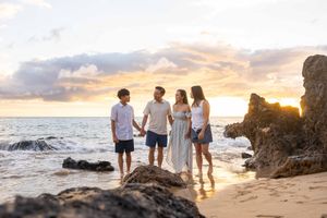 Maui family photographer photo against beautiful Maui sunset beach by ohwowfotos.