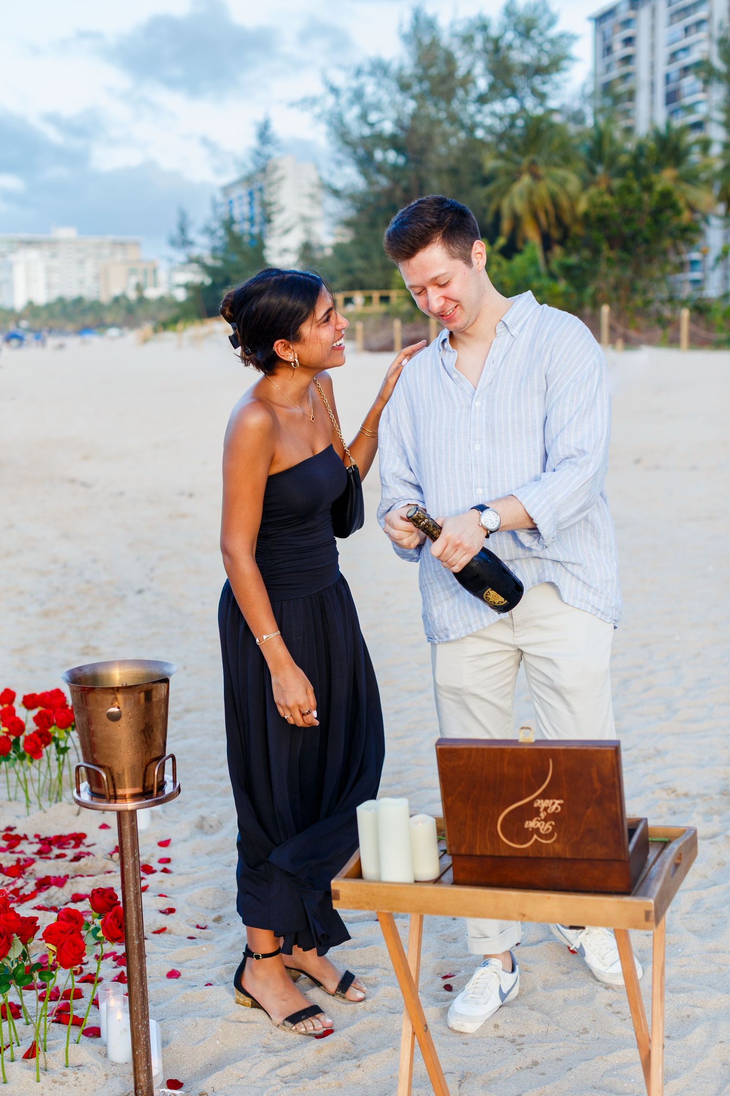 Couples portrait. Marriage proposal on the beach in Isla Verde, Carolina, Puerto Rico.