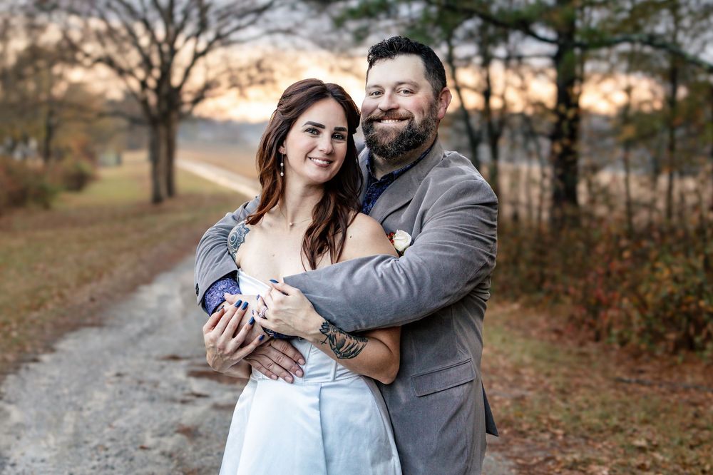 a close up portrait of a bride and groom standing