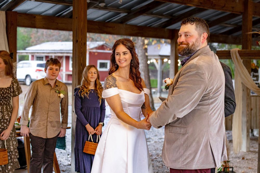 a bride and groom saying their vows