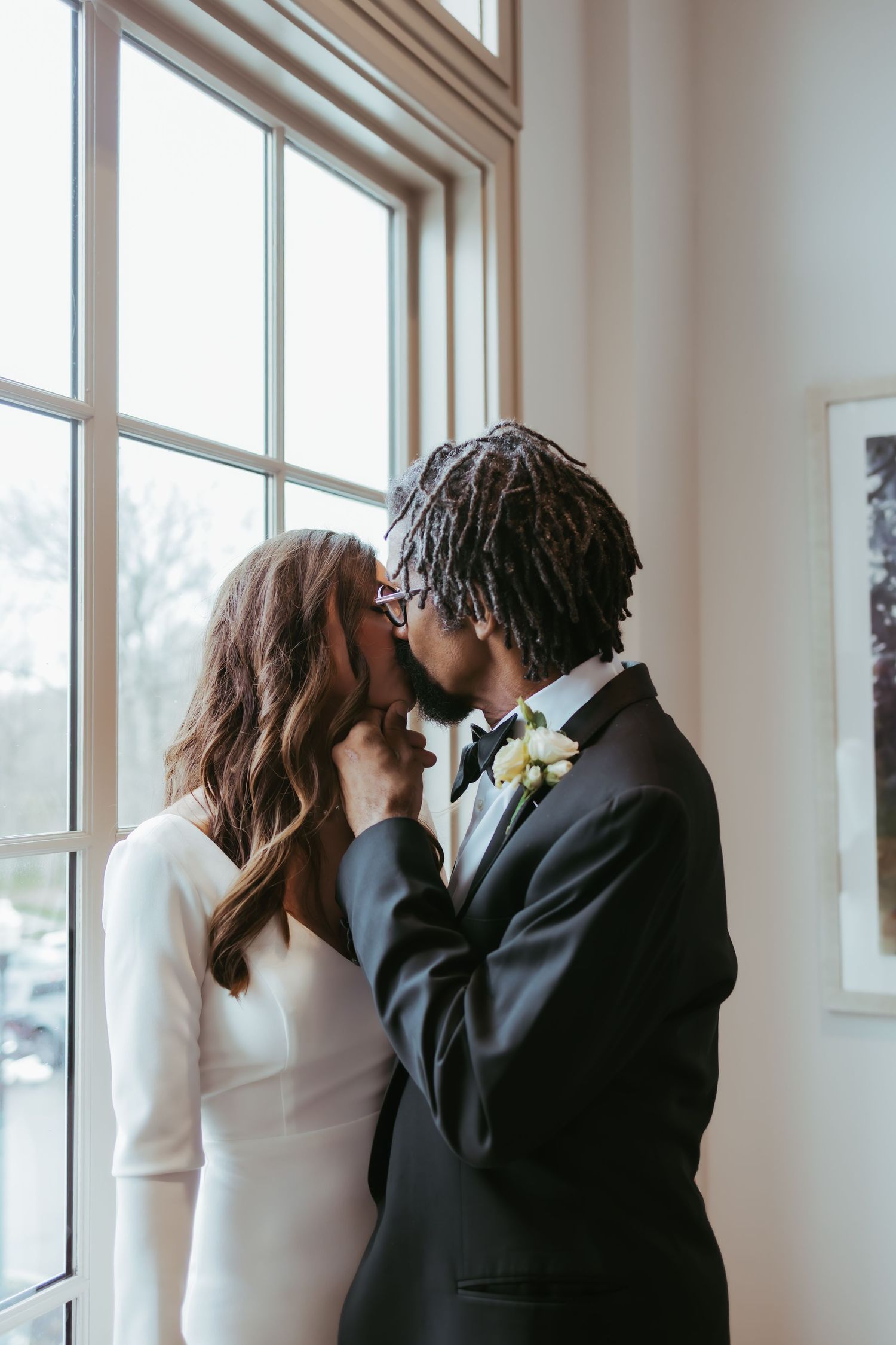 Bride and groom, wedding portrait kissing at Holliday Farms in Zionsville, Indiana