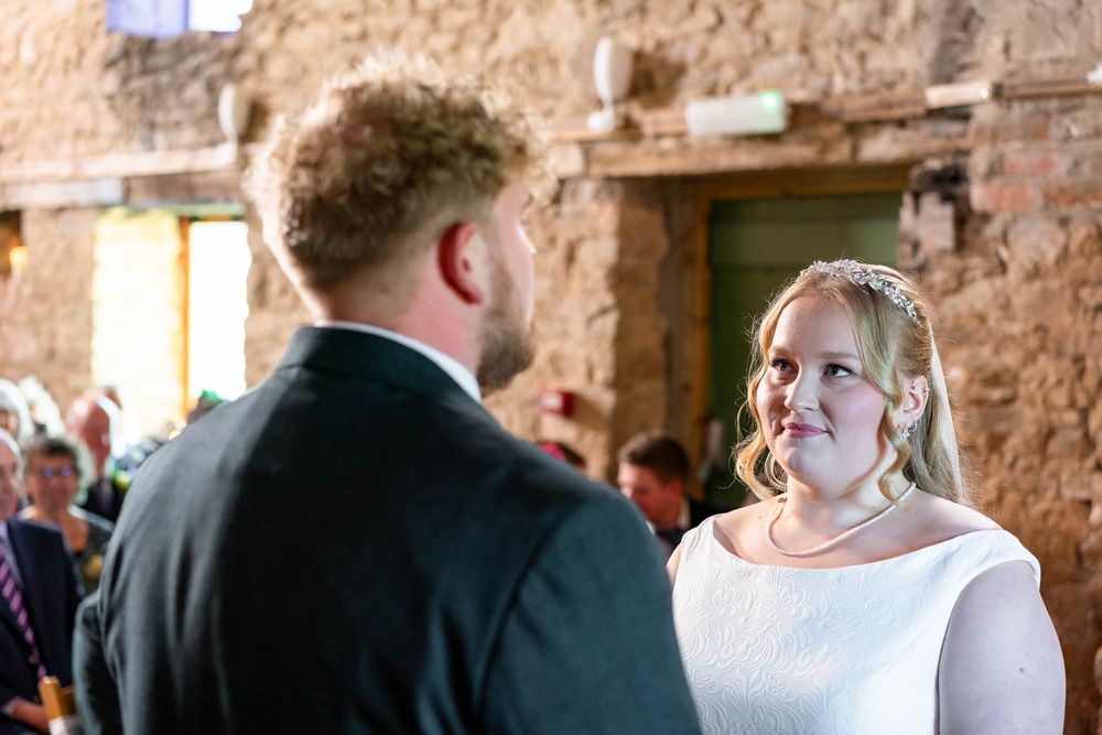 Relaxed Wedding ceremony photographed by Devon Wedding photographer at Ash Barton Estate.