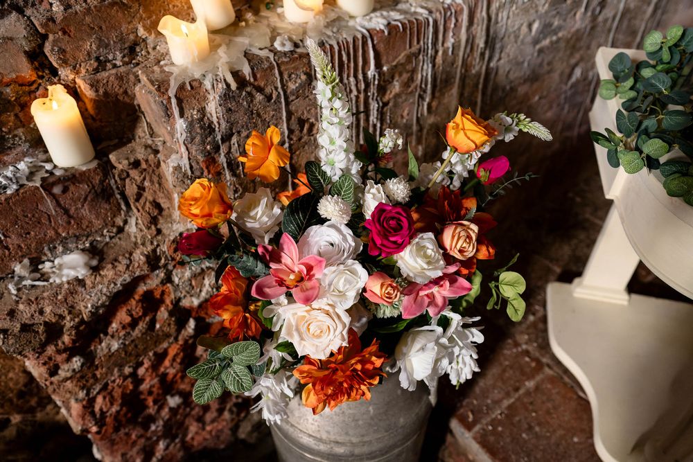 Beautiful flowers and candles in the Chapel at Ash Barton Estate in Devon.