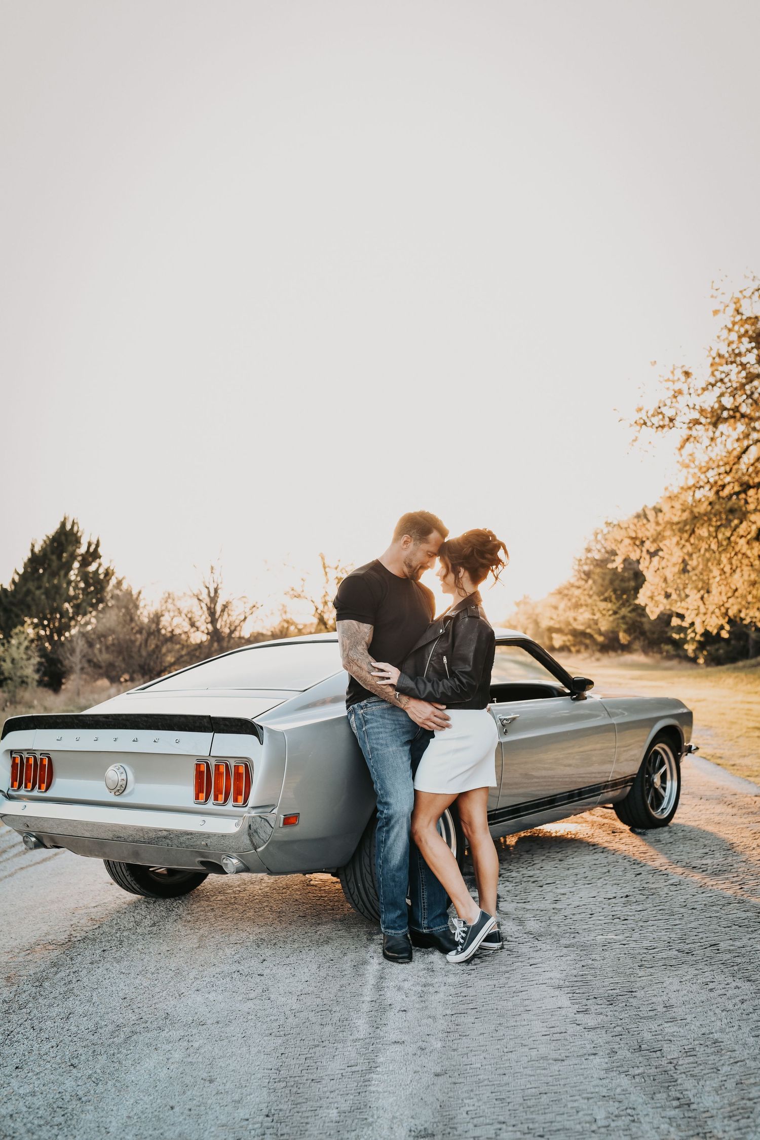 edgy engagement session with personalized jackets and vintage vibe