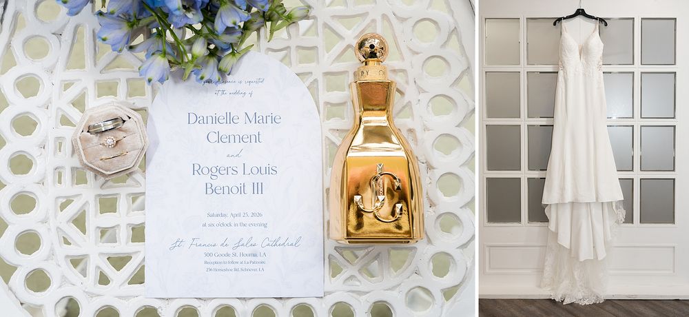 Wedding flat lay featuring elegant invitation suite, gold perfume bottle, and white bridal gown hanging on lattice backdrop.