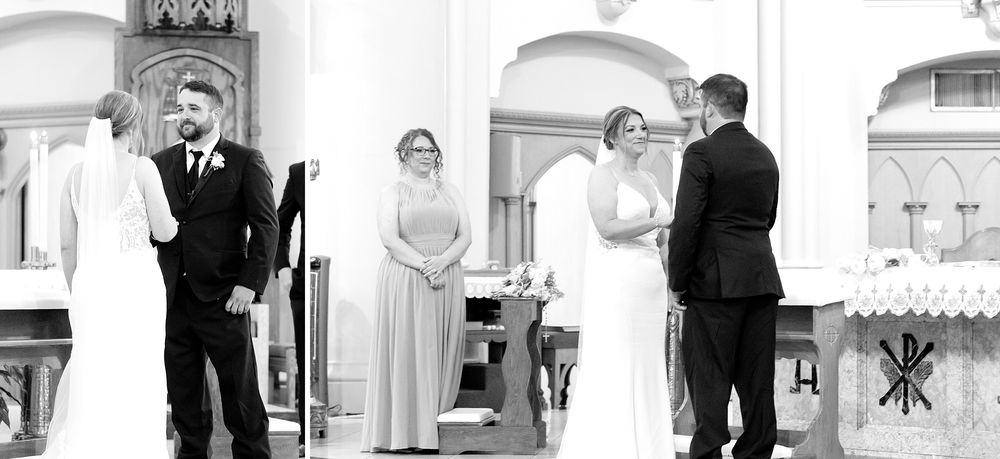 Black and white photo of bride and groom exchanging vows at the altar with officiant and bridesmaid.