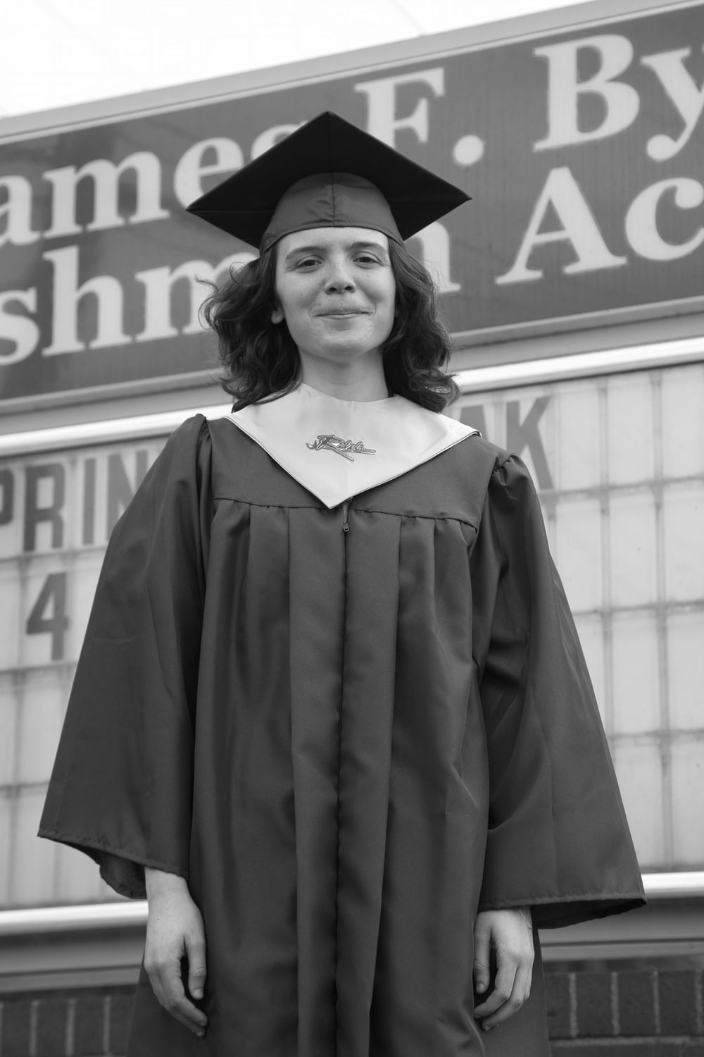 Black and white portrait of graduate in cap and gown at James F. Byrnes Academy, in Duncan SC.