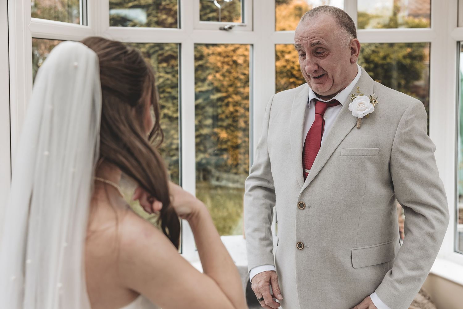 Natural, unobtrusive bride reveal moment before the wedding in Yorkshire.