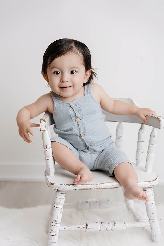 Professional and affordable photographer in Menifee, California: cute portrait of baby boy for his first birthday.
