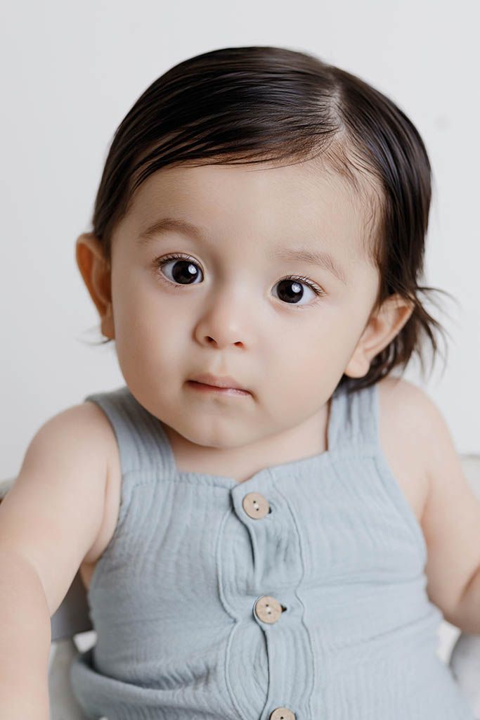 Affordable baby portrait photographer in Menifee, CA: cute baby boy's 1st birthday photo.