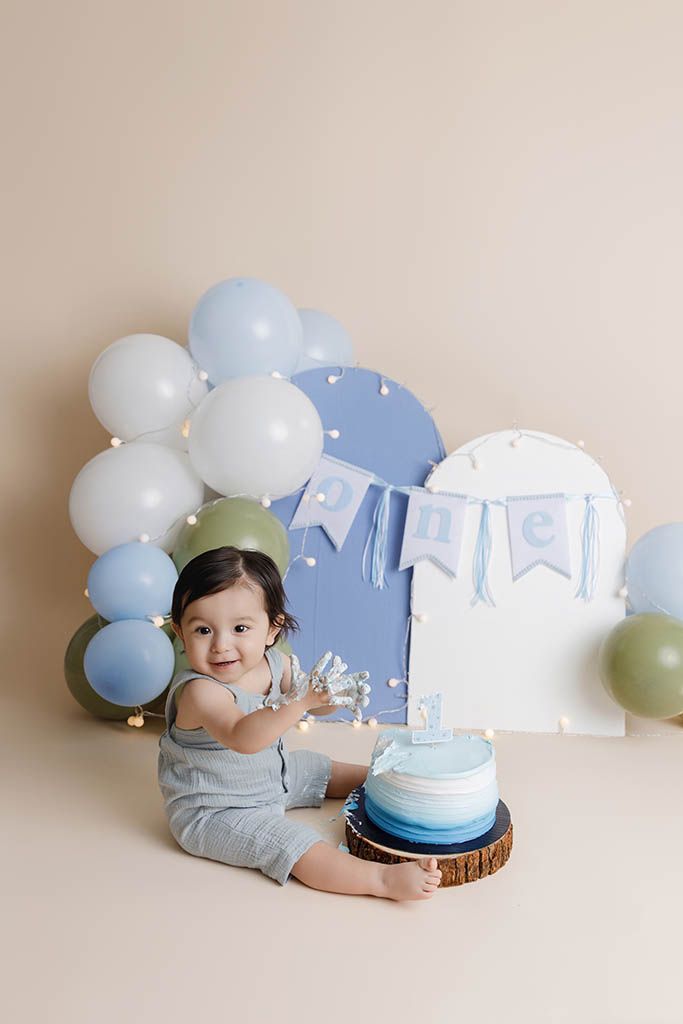 Affordable Menifee photographer in Southern California: baby boy's 1st birthday cake smash photoshoot.
