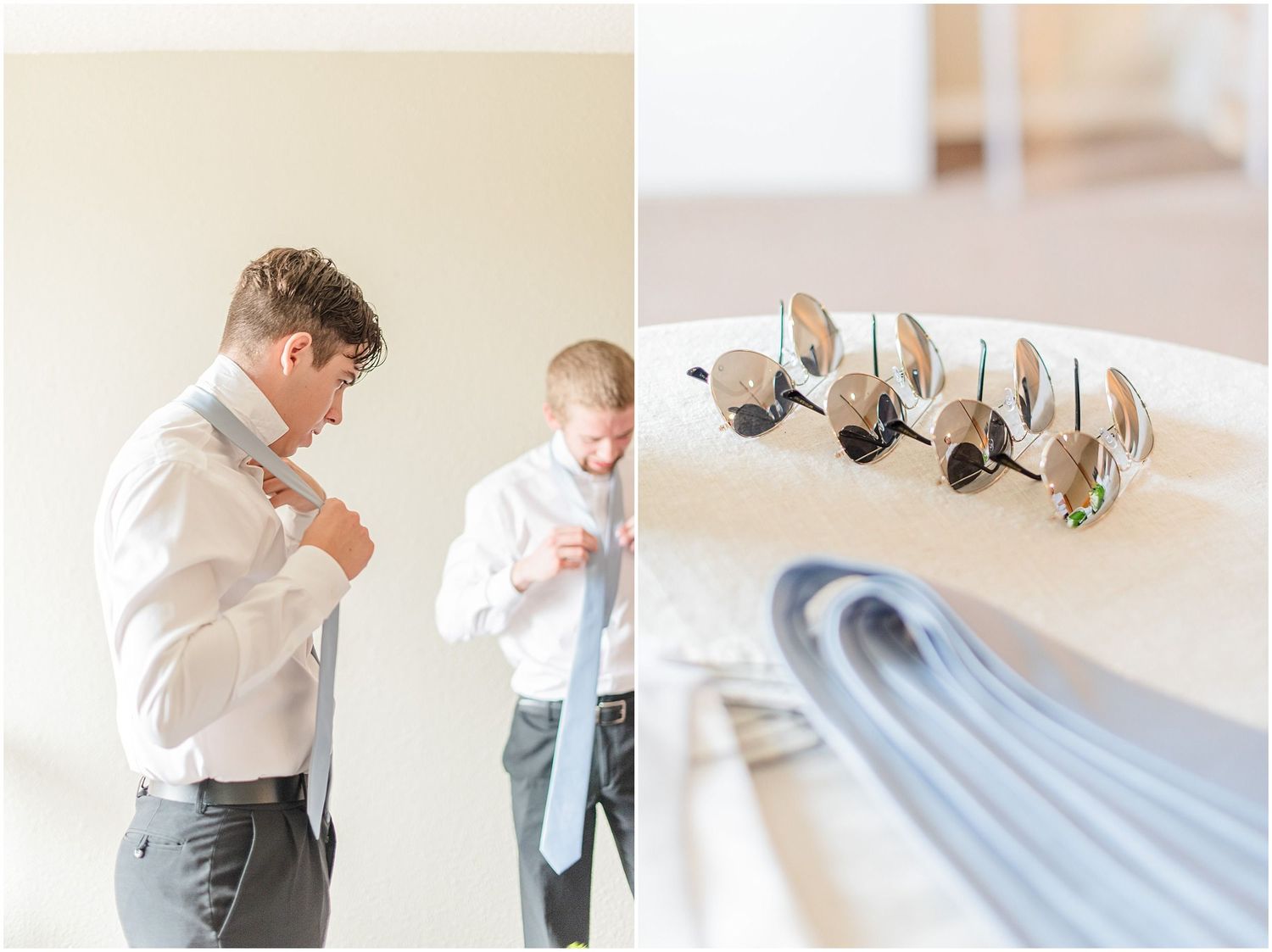 Groom preparing for wedding day by adjusting his tie, with groomsmen accessories displayed on a table nearby.