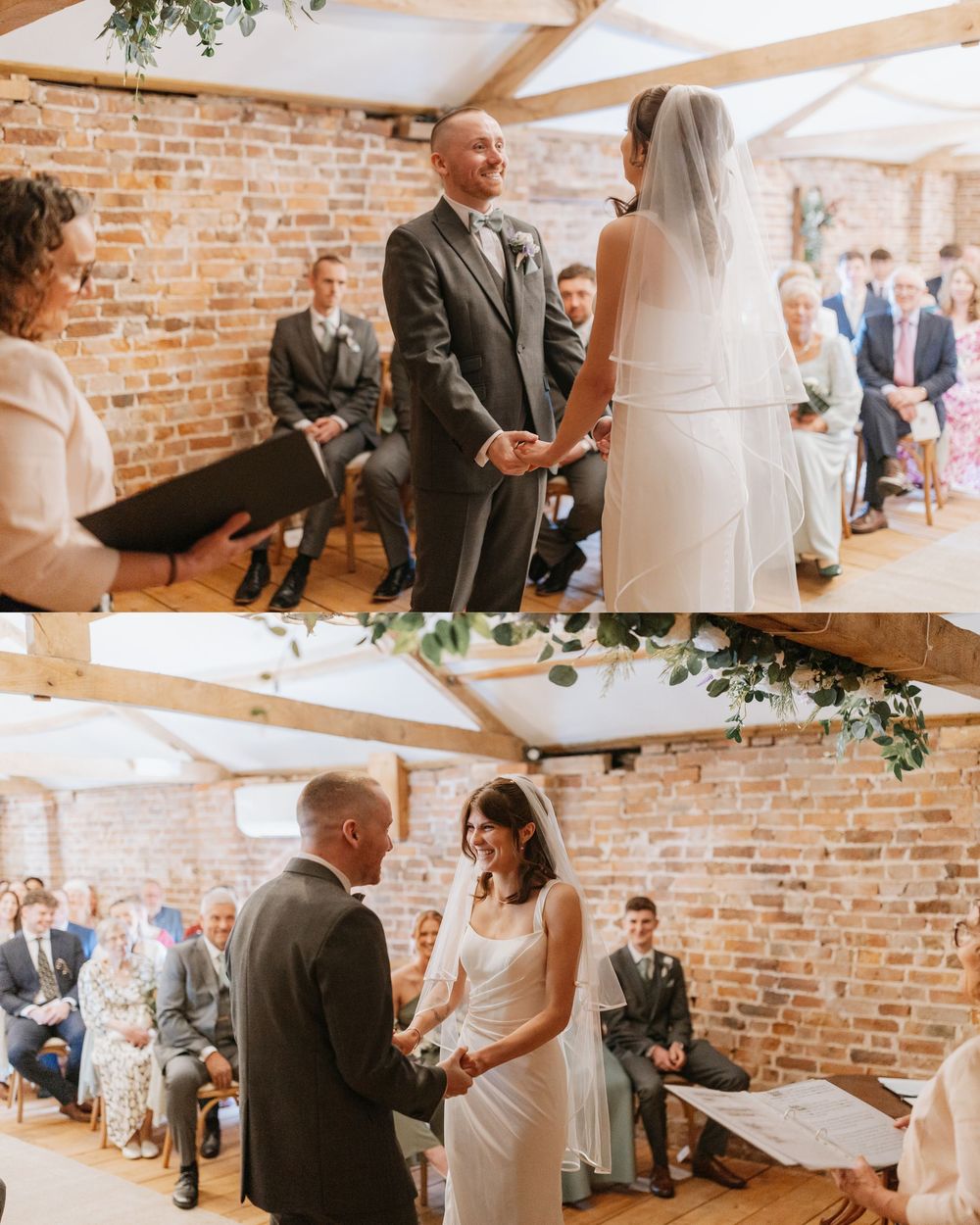 Couple exchanging vows at rustic barn wedding ceremony with exposed brick walls and wooden beams.