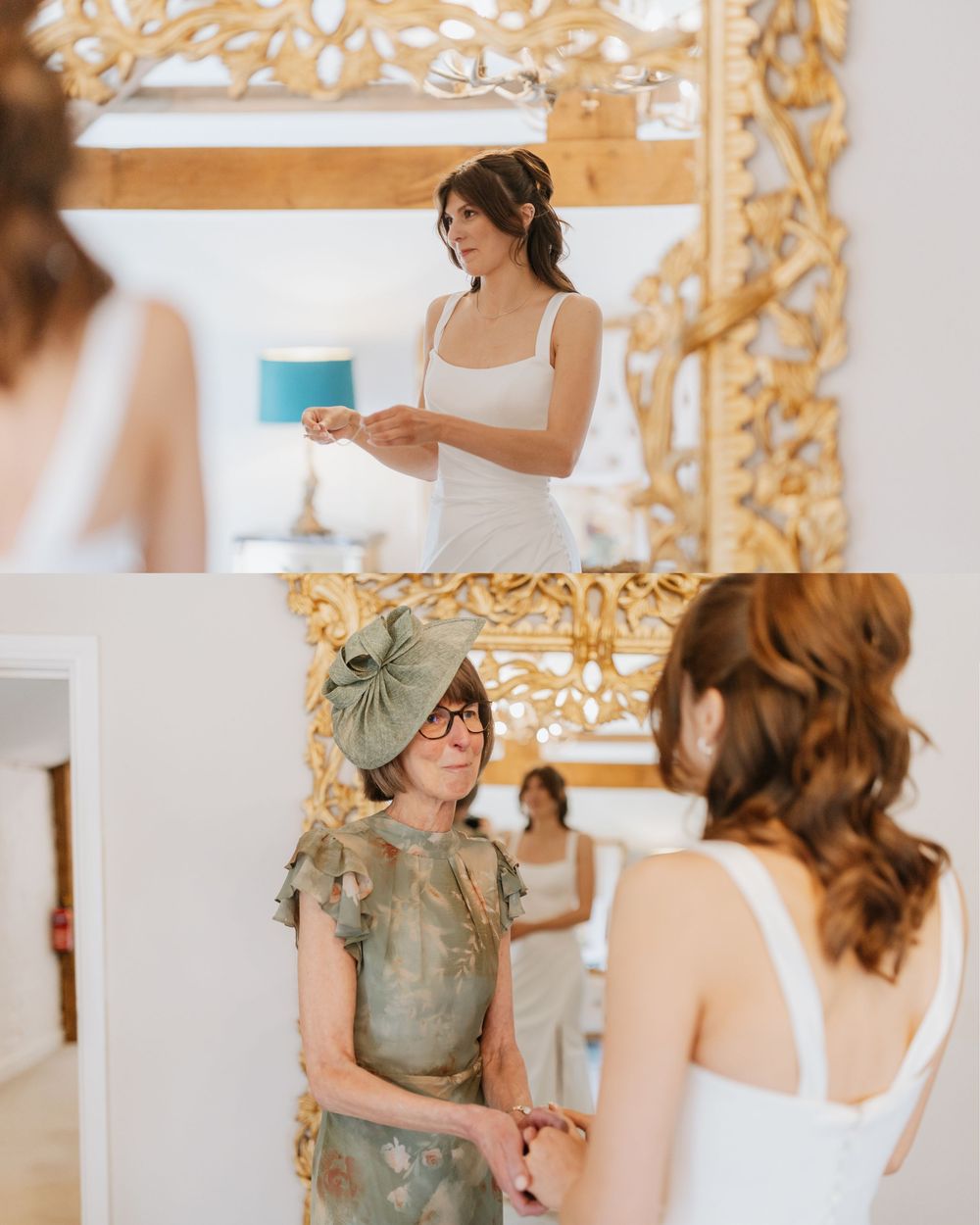 Bride preparing for wedding ceremony while older woman in sage green dress and fascinator hat holds her hands in bright white room.