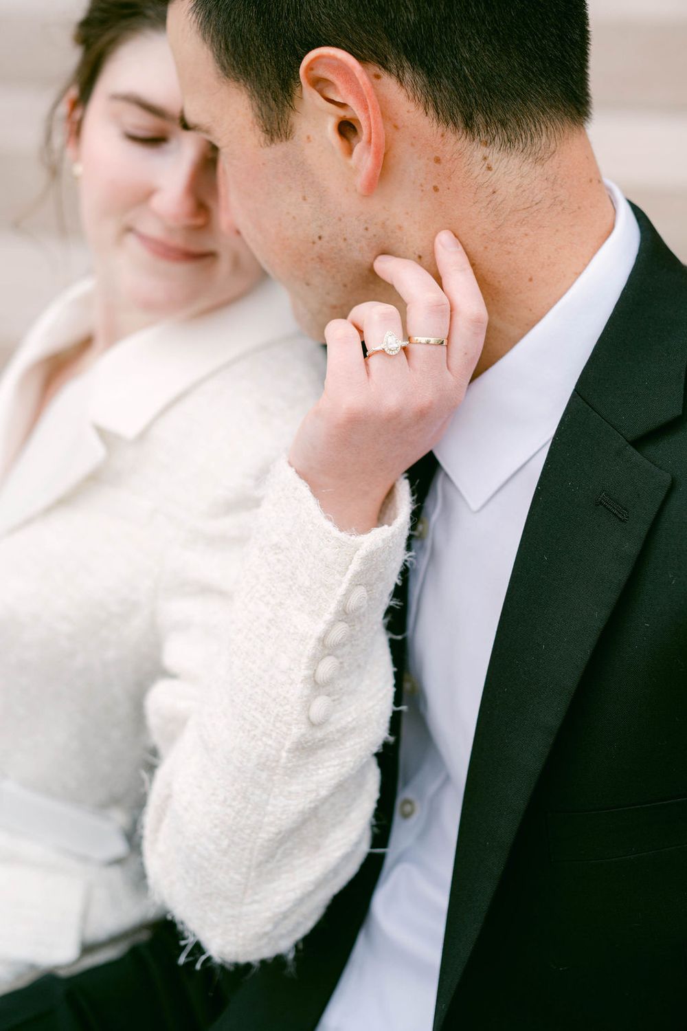 Romantic sequence of close-up wedding moments in soft white tones.
