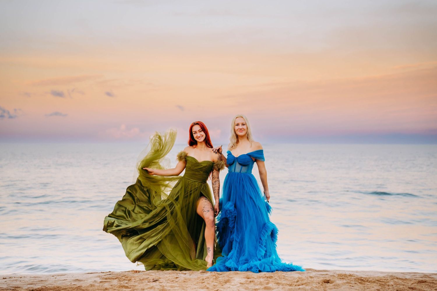 Two flowing dresses catch the wind against a sunset beach backdrop princess beach photos wailea hawaii sunrise sisters photos