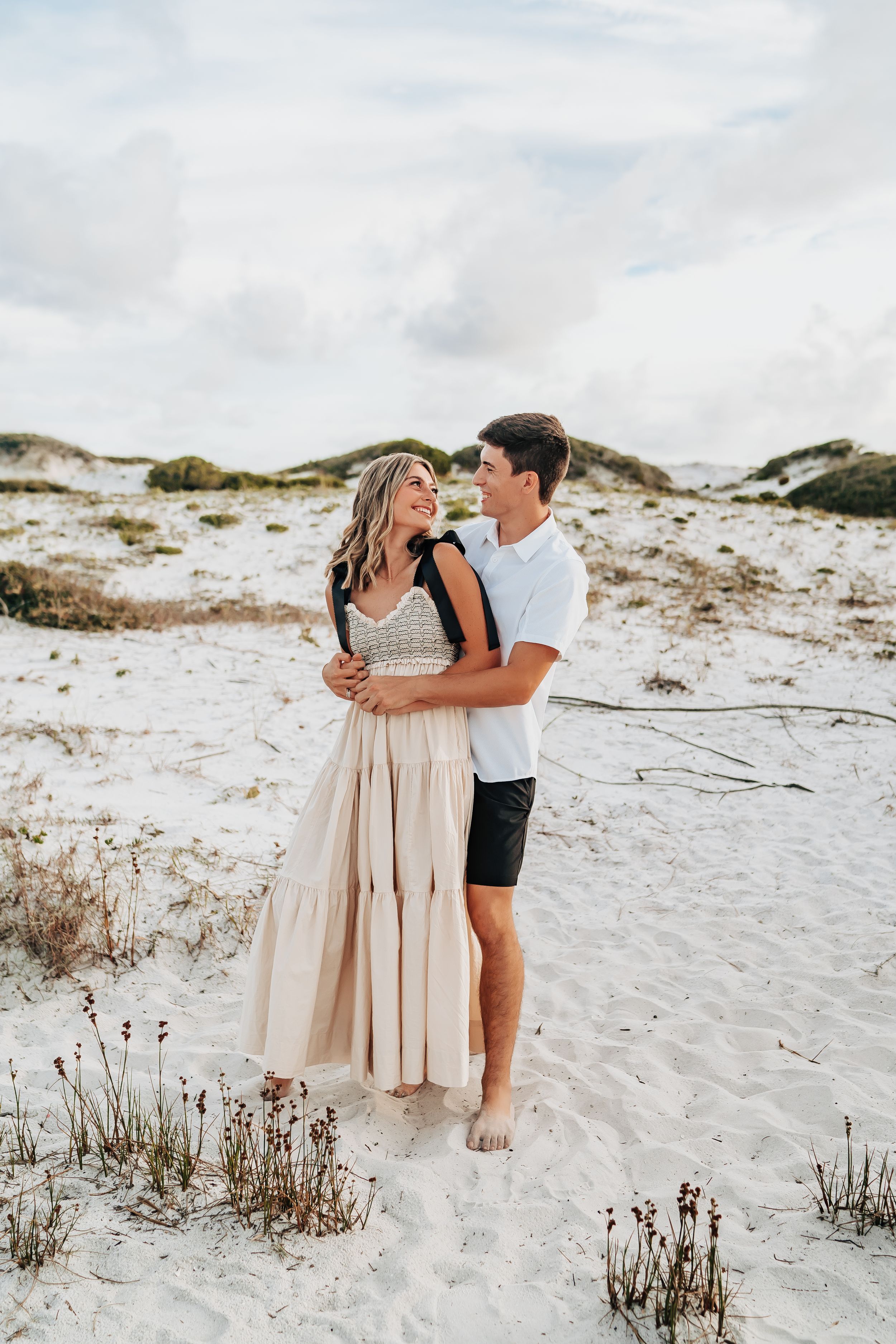 30A Florida Couples Photo Session At Grayton Beach State Park Free People Dress Against The Dunes Bryce And Isa