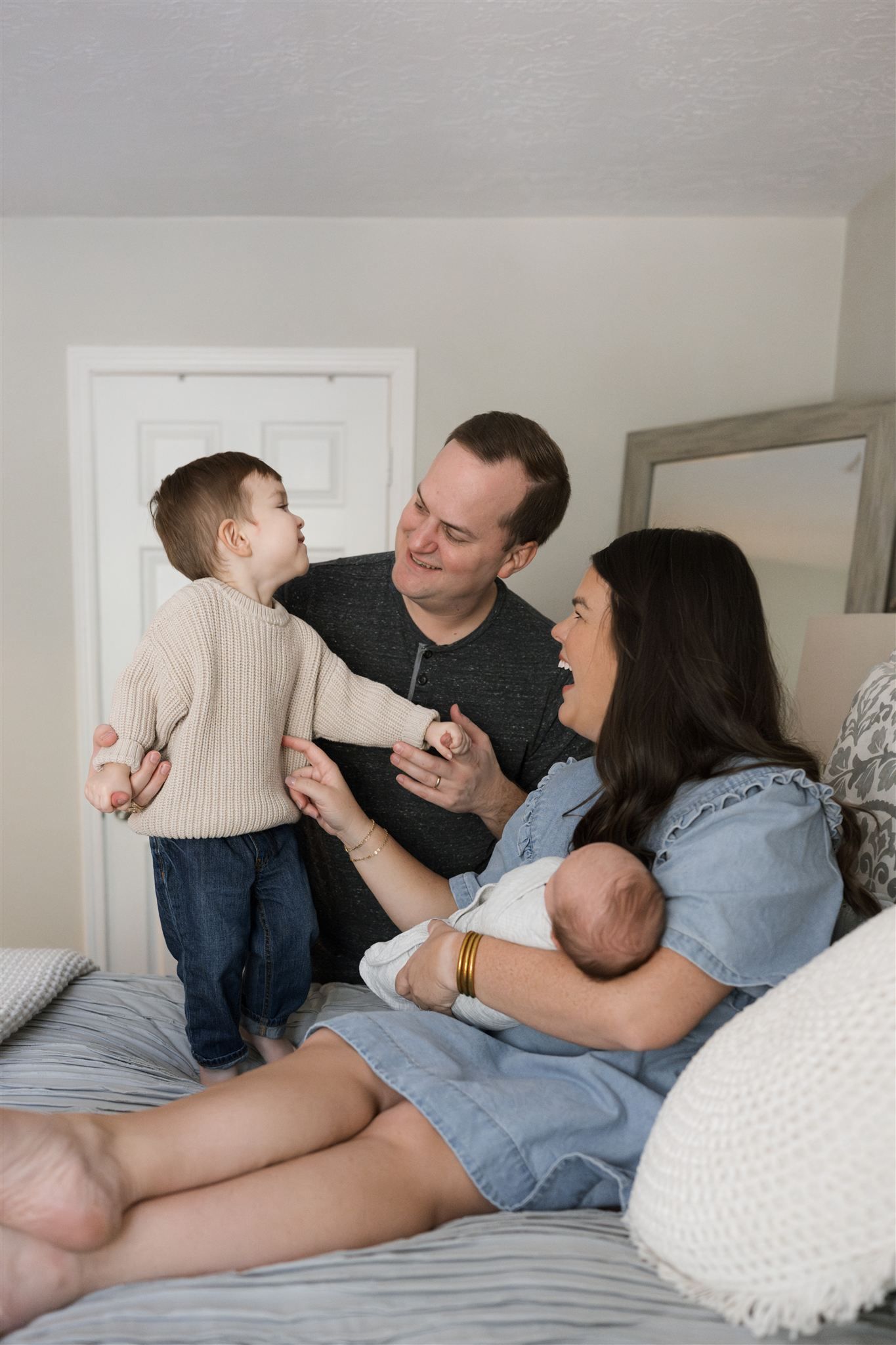 A playful moment during a family photo session in The Woodlands Tx