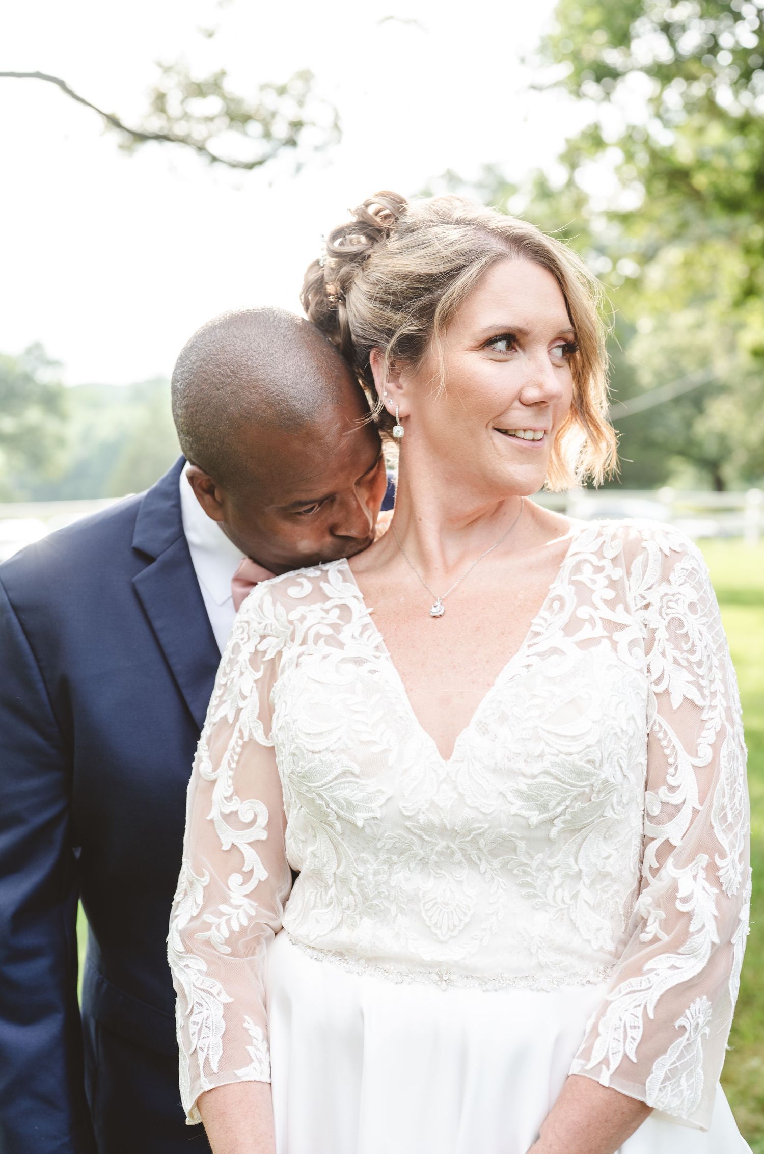Romantic outdoor wedding moment at Wright’s Chicken Farm in Burrillville, Rhode Island