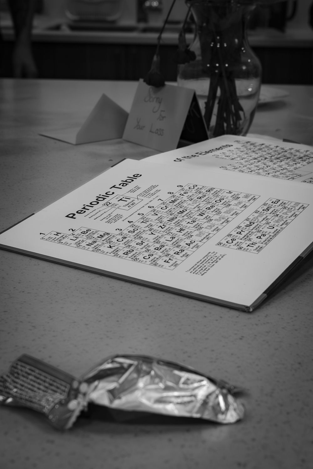 Script or storyboard pages laid out on dark surface during film production.