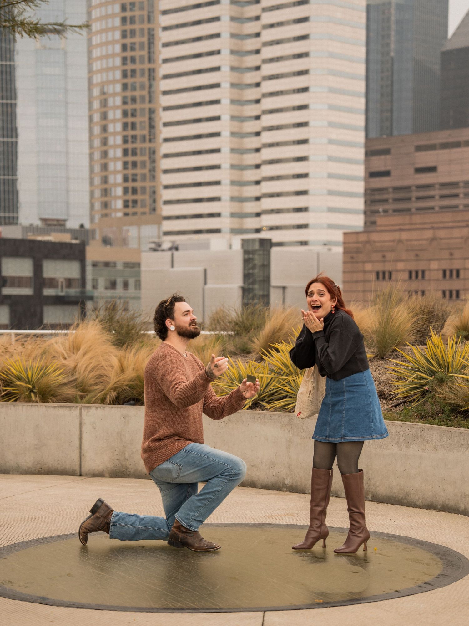 A sequence of five photos showing two people acting out a dramatic scene on an urban rooftop terrace.
