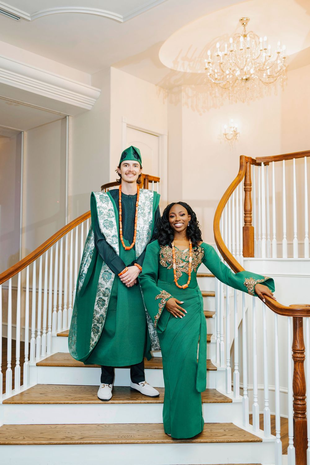 A series of five photos showing people in matching emerald green outfits sitting on white stairs with wooden railings.