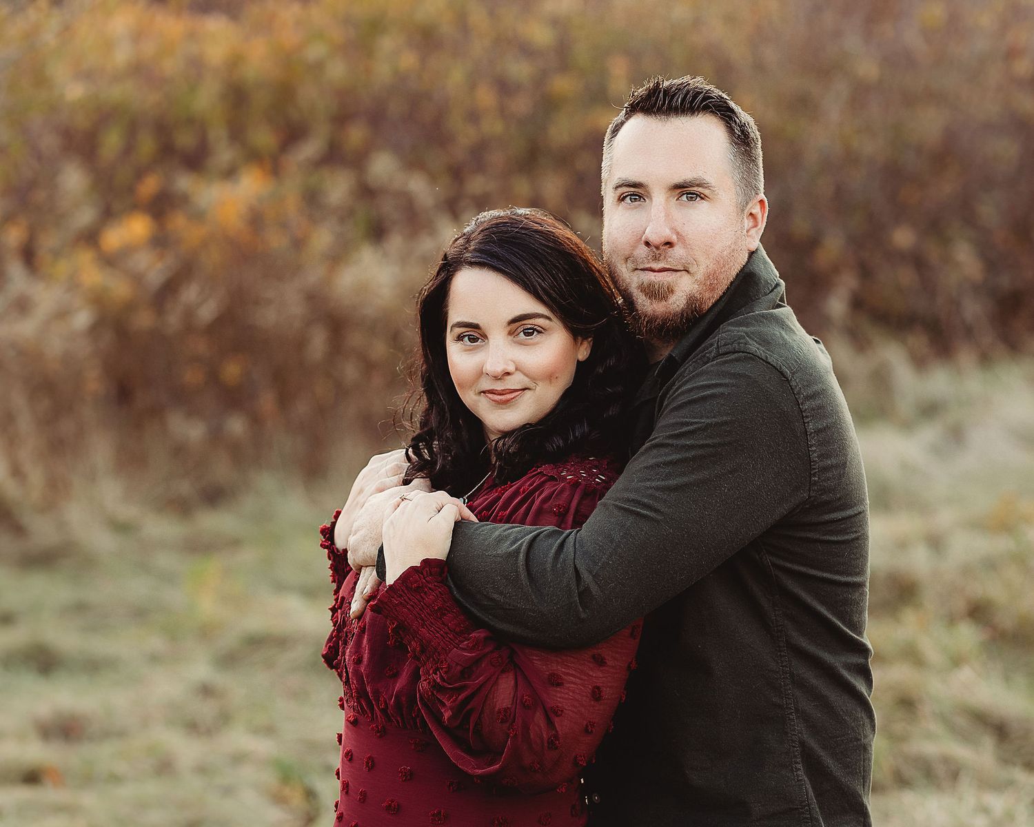 Professional photo of a couple in a field