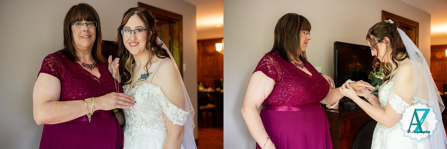 Two women share a tender moment while getting ready in a warmly lit room, one in magenta and one in white.