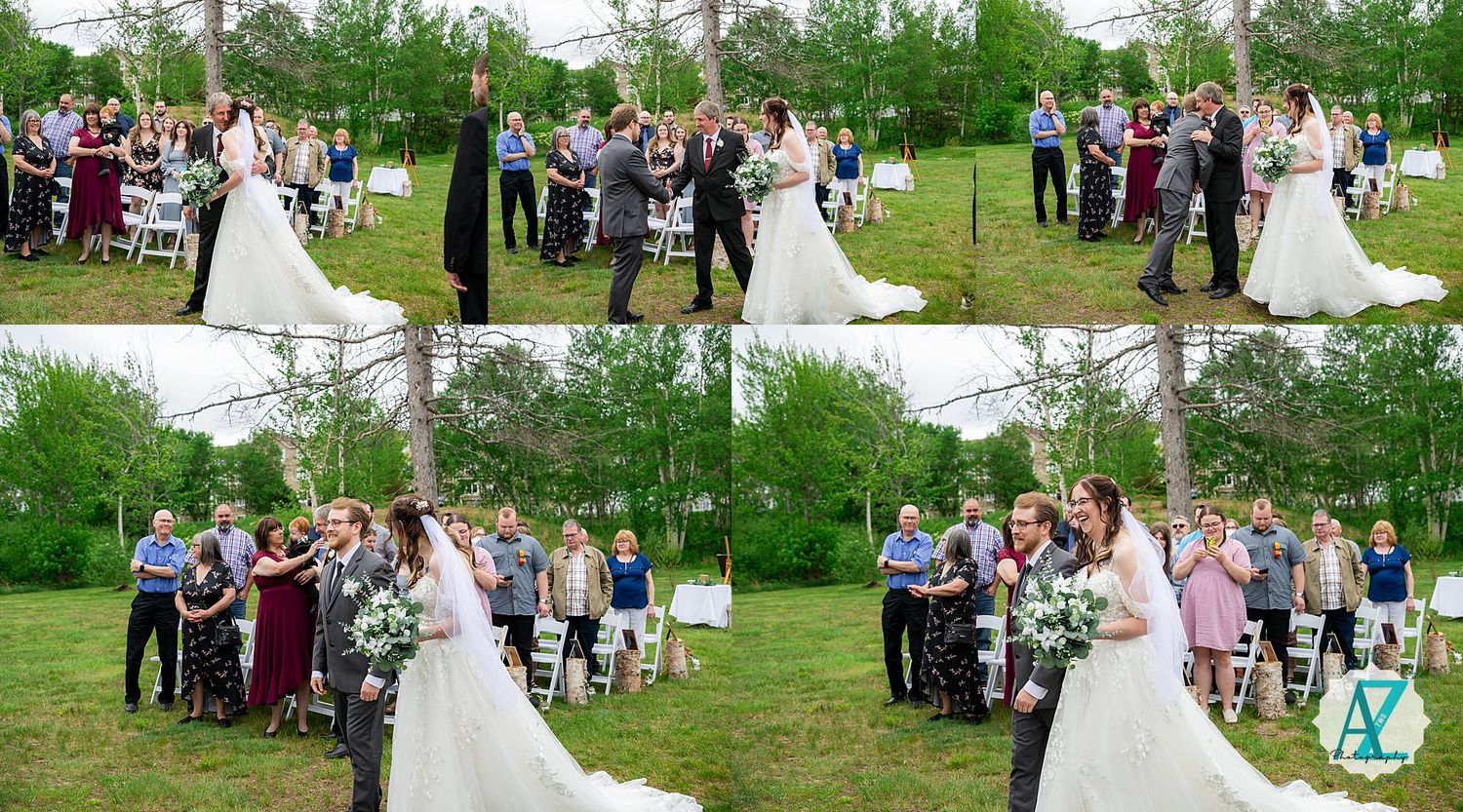 Outdoor wedding ceremony takes place in lush green field with guests gathered to celebrate the special moment.