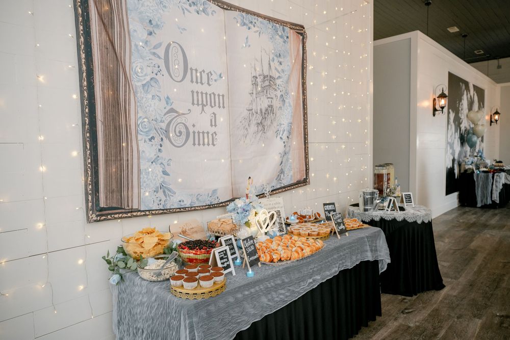 styled wedding dessert display at DFW bridal shower with string lights and themed backdrop