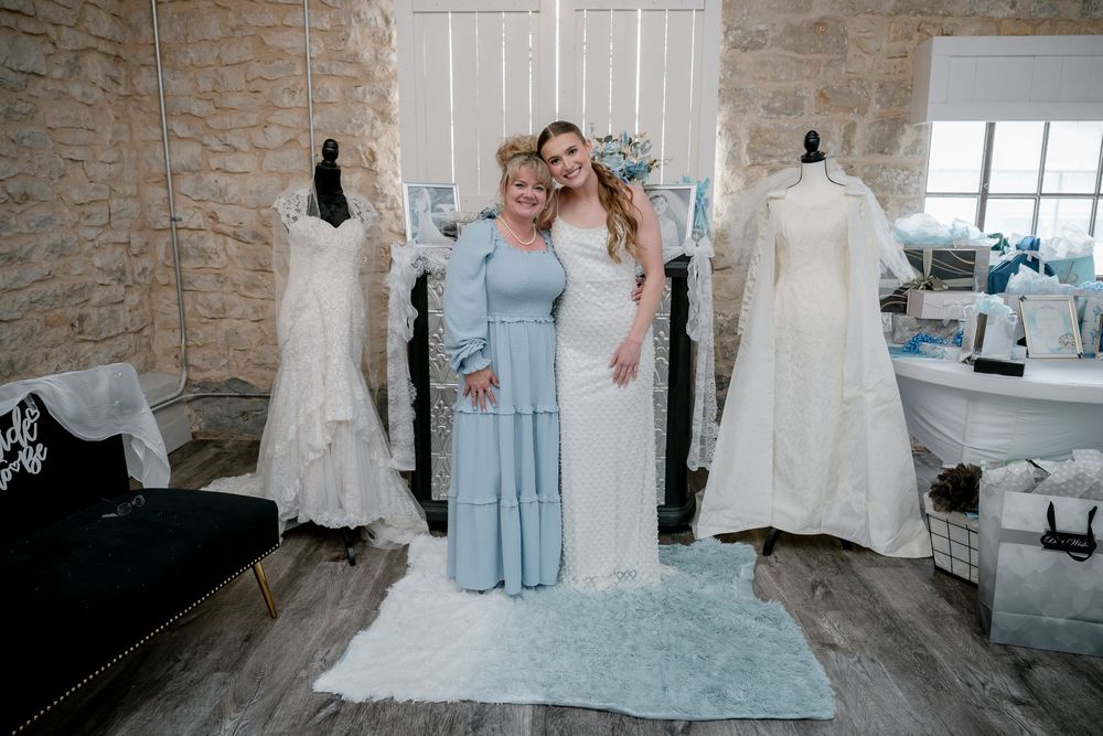 mother of the bride sharing a sweet moment together in DFW at a cinderella themed shower