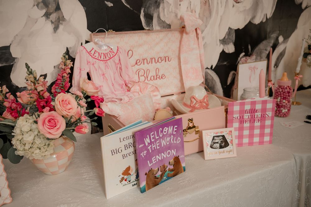 Floral baby shower gift table displayed at a Fort Worth venue