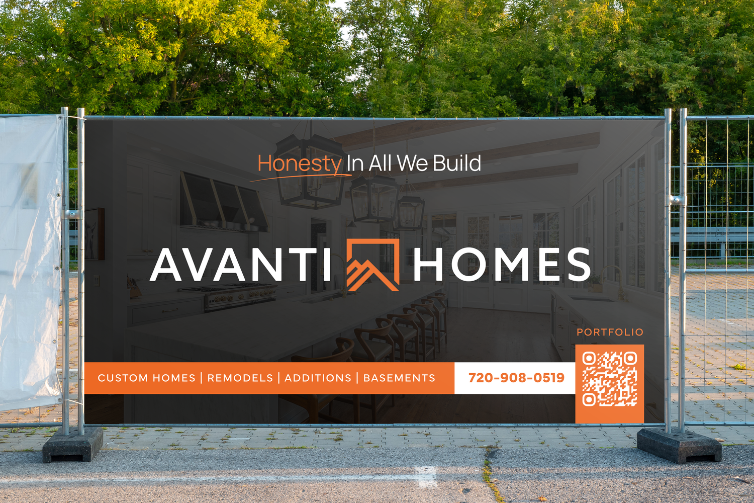Construction site banner for Avanti Homes displaying company logo and slogan 'Honesty In All We Build' on black background.