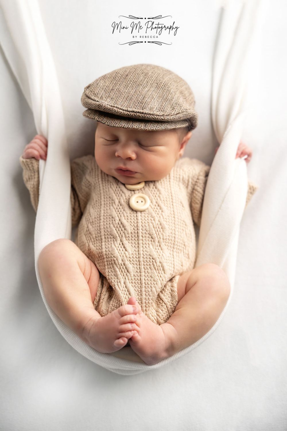 newborn baby photoshoot swing pose
