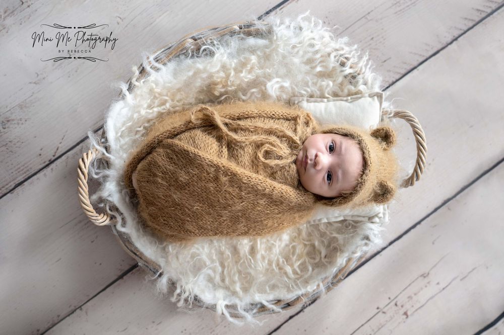 Wrapped newborn baby professional photography session in Lichfield