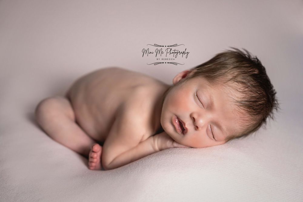 Professional studio photo of Newborn baby girl