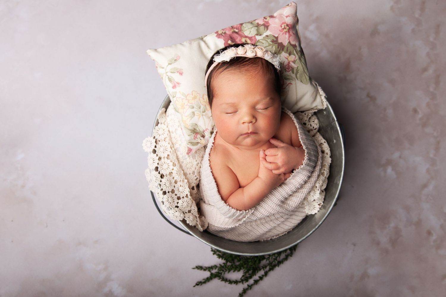 Newborn posing by kara jade photography