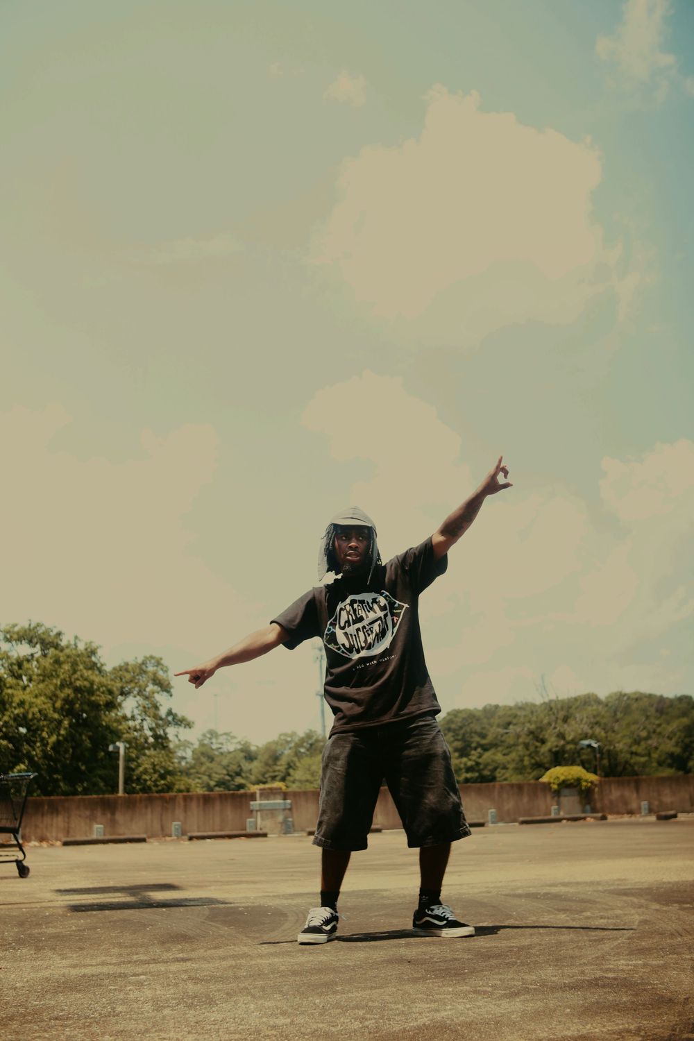 A skateboarder performs a dynamic trick sequence across multiple frames on an empty concrete surface.