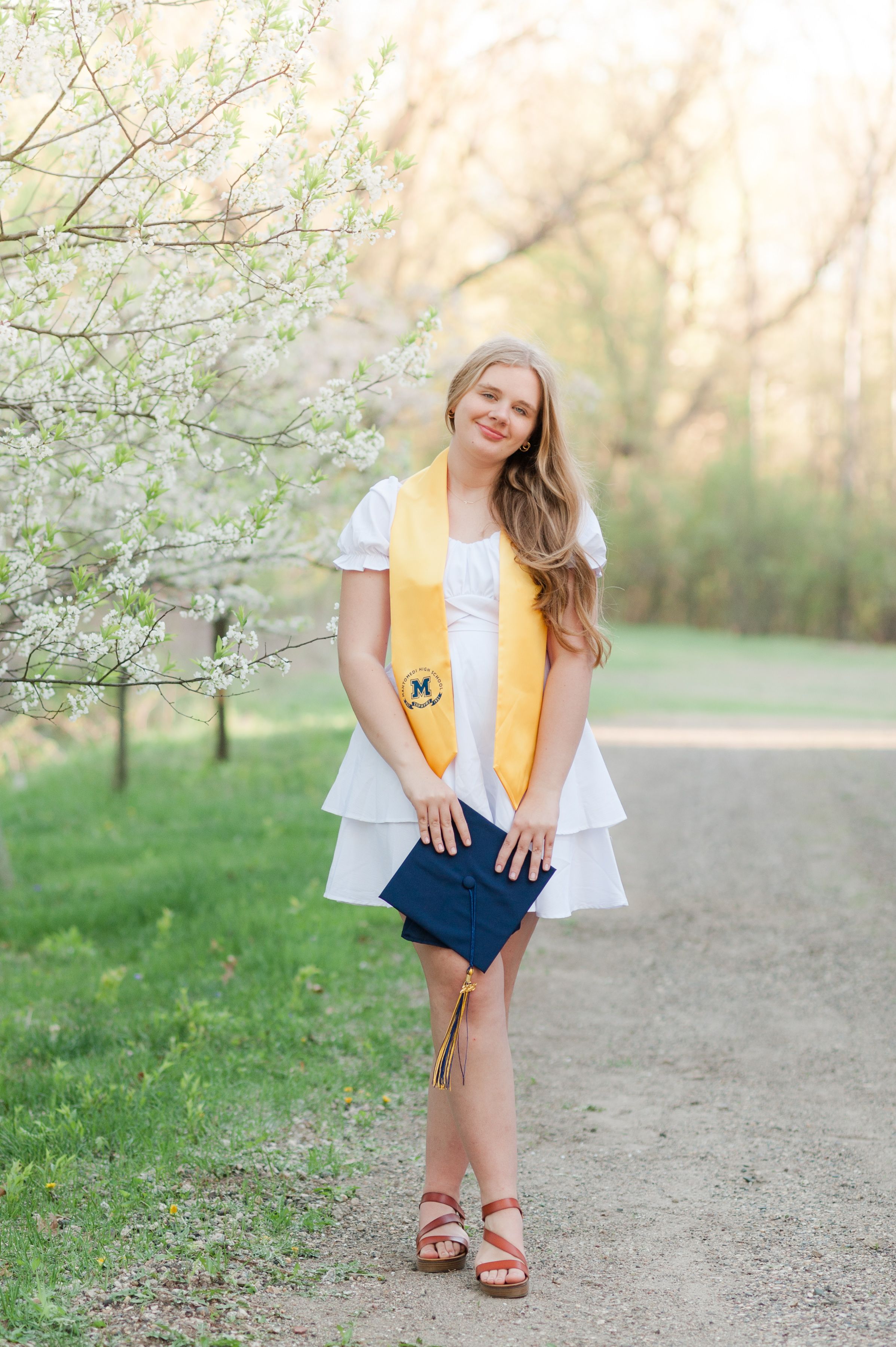 Graduation, Cap and Gown, flowering trees, spring, sunset, glowy light, dirt path, Twin Cities Minnesota Photographer, Mahtomedi, Stillwater