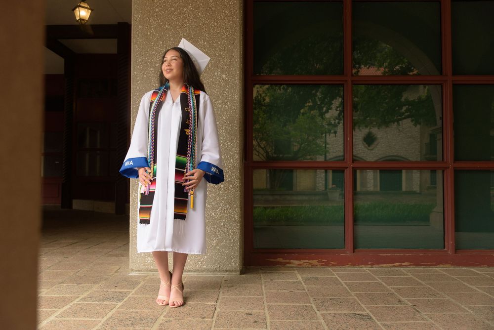 high school senior in cap and gown