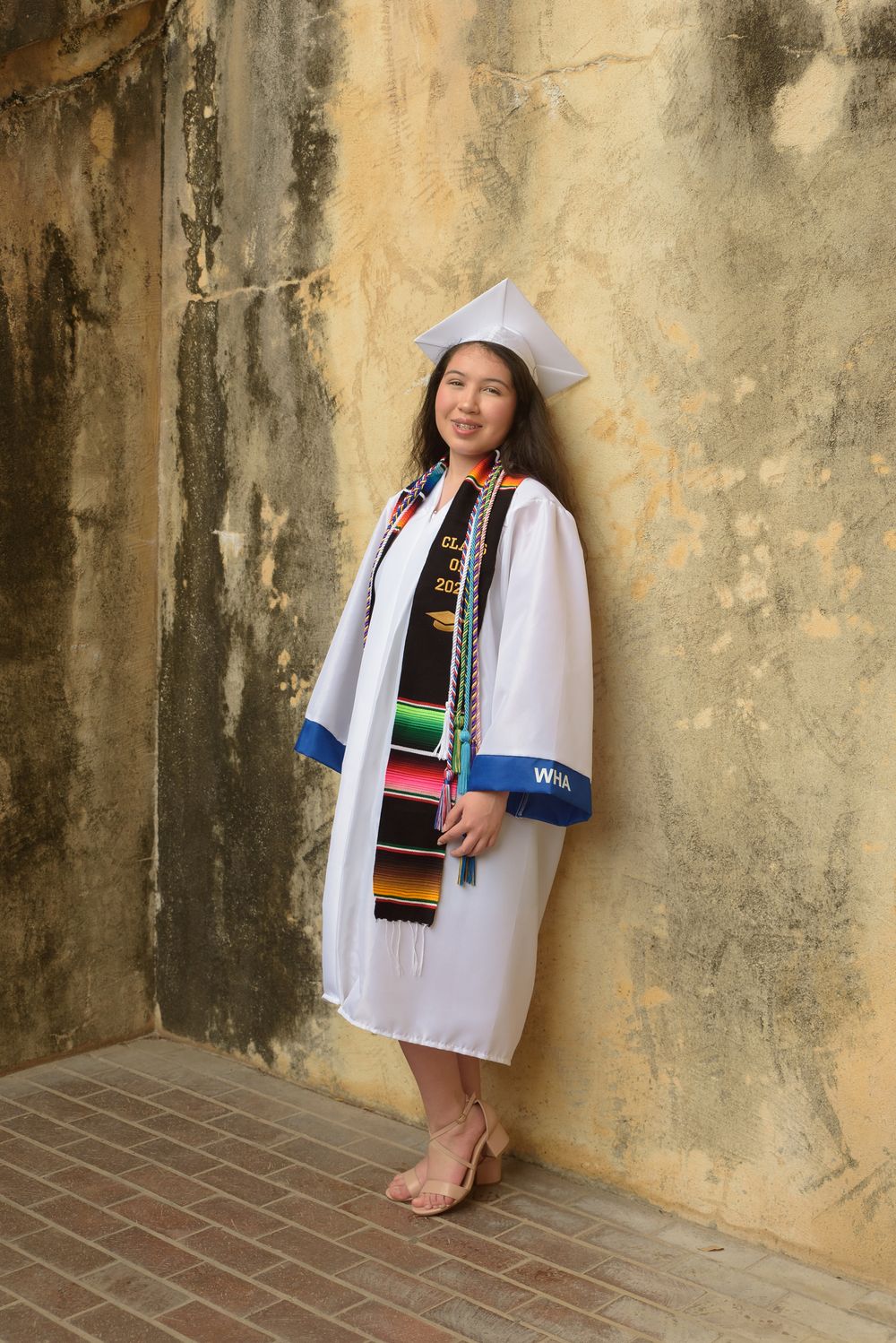 w.h. adamson high school senior in cap and gown