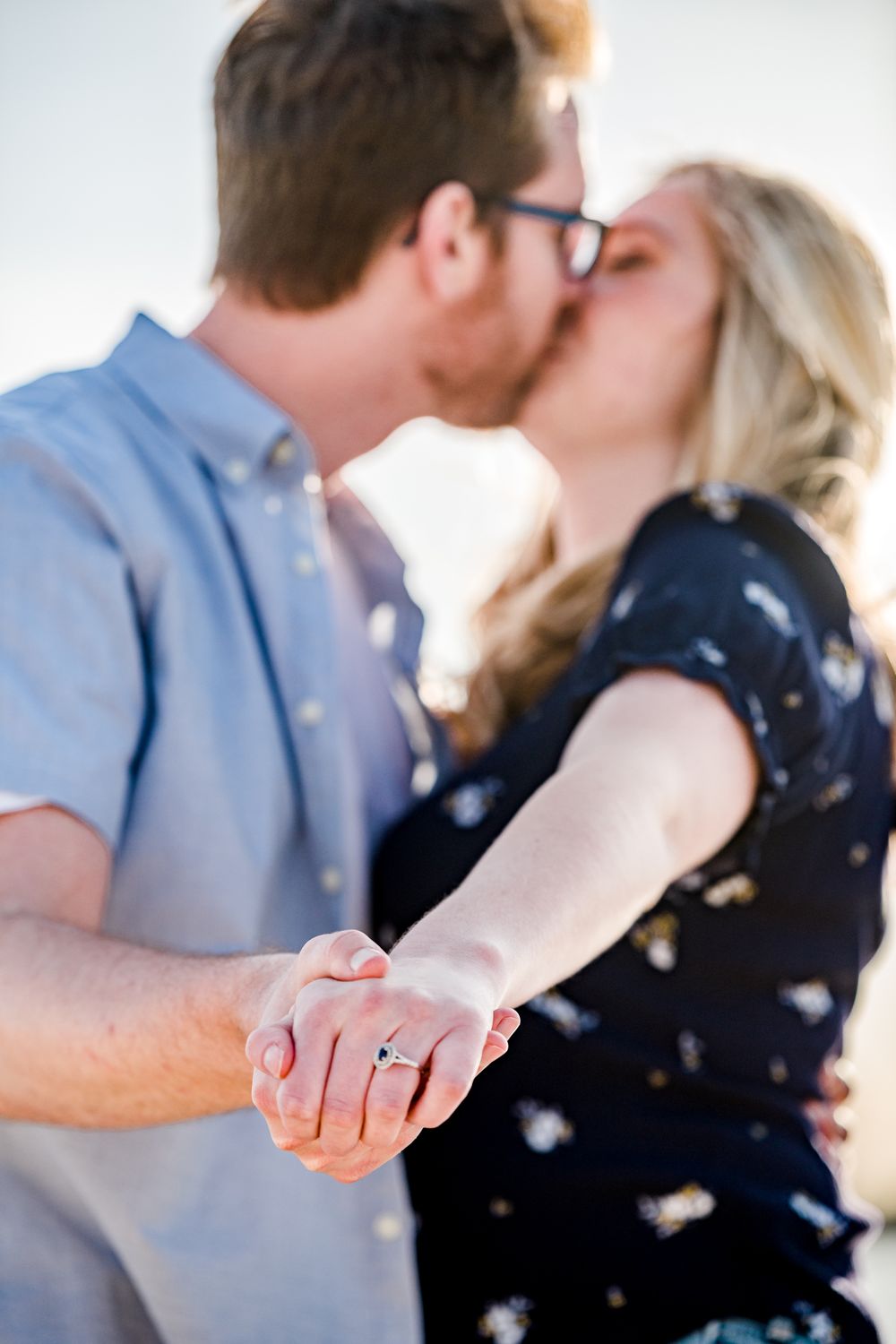 Romantic couple sharing intimate moment while dancing during their engagement session by Stephanie Coulter Photography