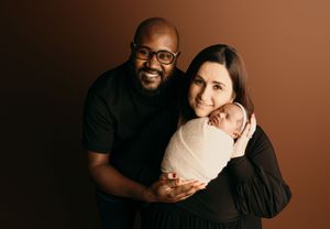 A series of warm-toned studio portraits showing tender moments between a couple against a dark brown backdrop.