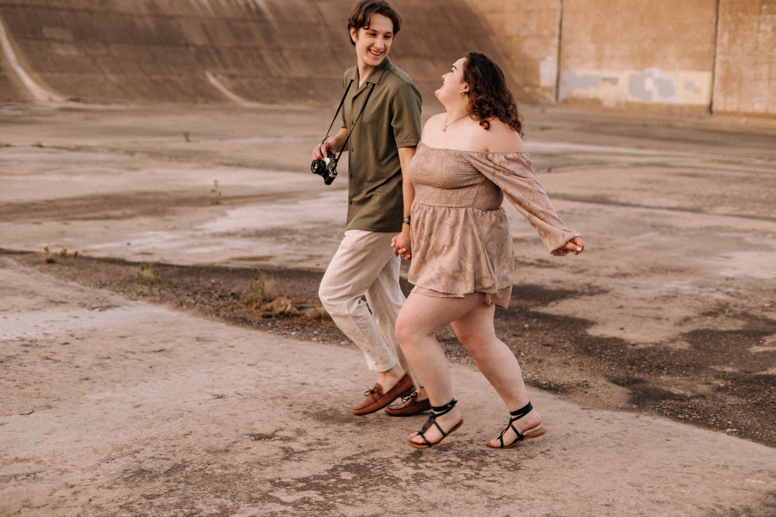 couple running on concrete