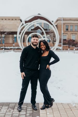 couple standing in snow