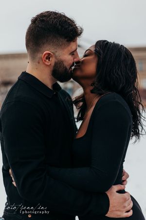 couple hugging outside