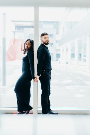 couple standing in library